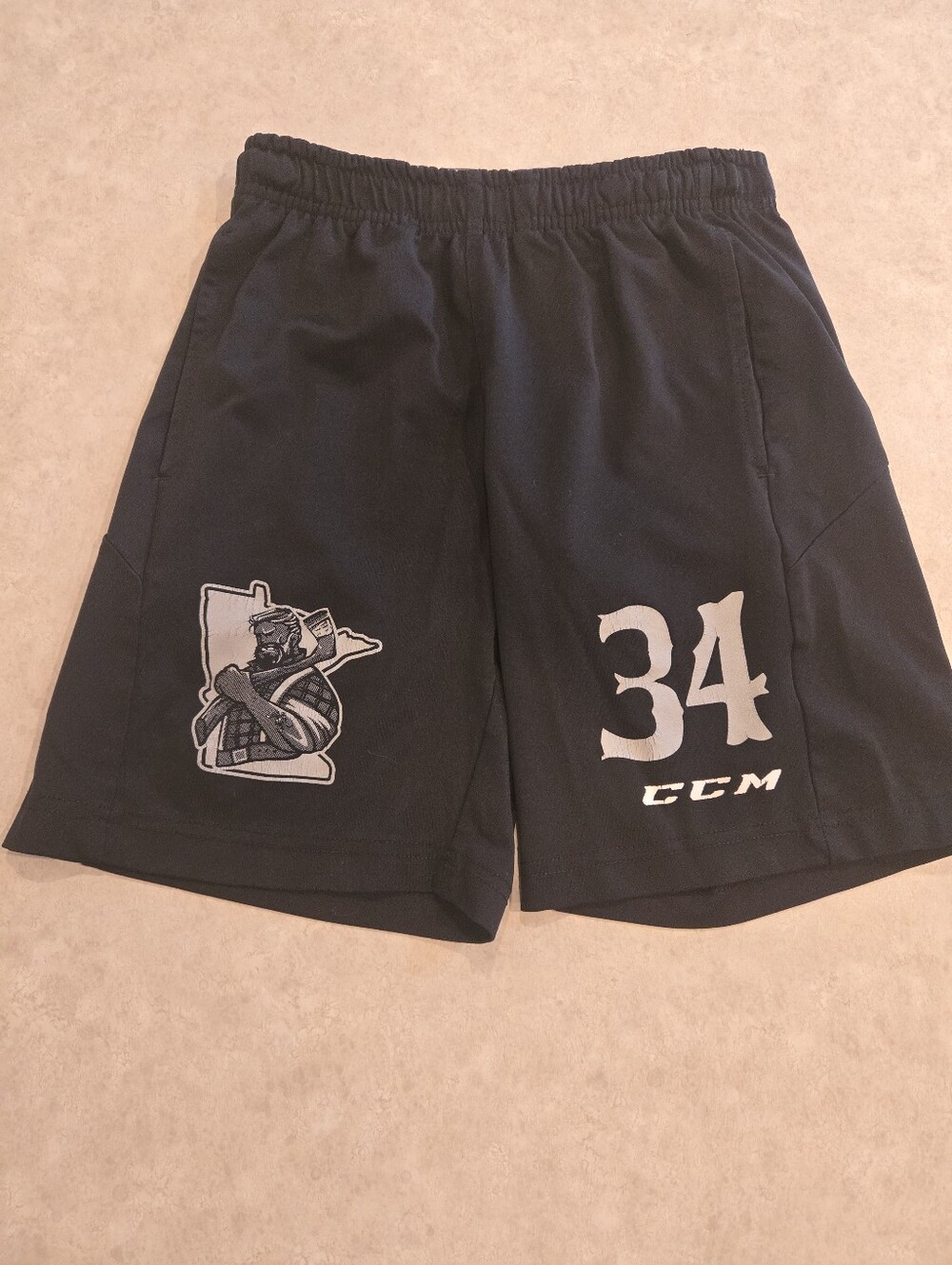 Minnesota Legends AAA hockey CCM Youth Shorts. Size Medium.